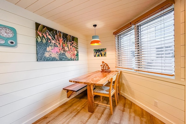 78-261 Manukai St Unit 3403, Kailua-Kona, HI 96740 - dining room featuring wood walls, light wood finished floors, and wood ceiling