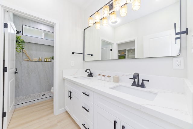 16-2050 Coconut Dr, Pahoa, HI 96778 - bathroom with double vanity, wood finished floors, and walk in shower