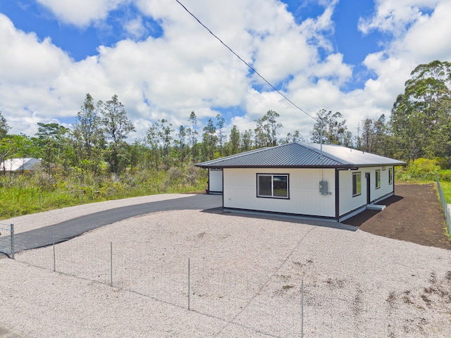 16-2050 Coconut Dr, Pahoa, HI 96778 - view of front of house featuring gravel driveway and a metal roof