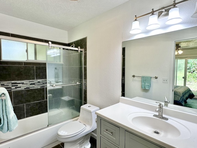 15-240 N Puni Makai Loop, Pahoa, HI 96778 - full bath featuring a textured ceiling, vanity, connected bathroom, combined bath / shower with glass door, and toilet