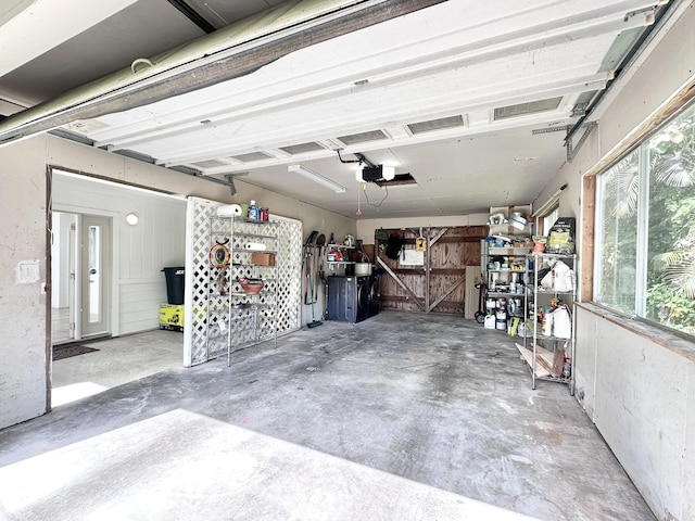15-240 N Puni Makai Loop, Pahoa, HI 96778 - garage featuring a garage door opener and a workshop area