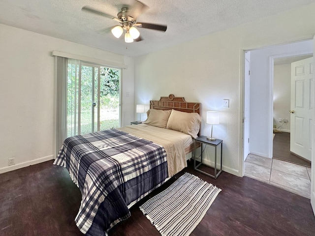 15-240 N Puni Makai Loop, Pahoa, HI 96778 - bedroom with a textured ceiling, baseboards, ceiling fan, and access to outside