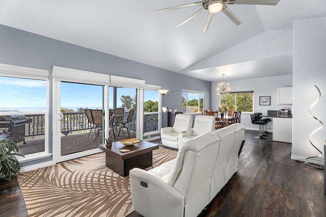 73-4100 Kulanui Pl, Kailua-Kona, HI 96740 - living area featuring vaulted ceiling, ceiling fan, wood finished floors, and a chandelier