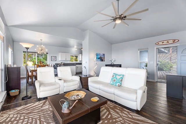 73-4100 Kulanui Pl, Kailua-Kona, HI 96740 - living room with lofted ceiling, dark wood-style flooring, a ceiling fan, a chandelier, and baseboards