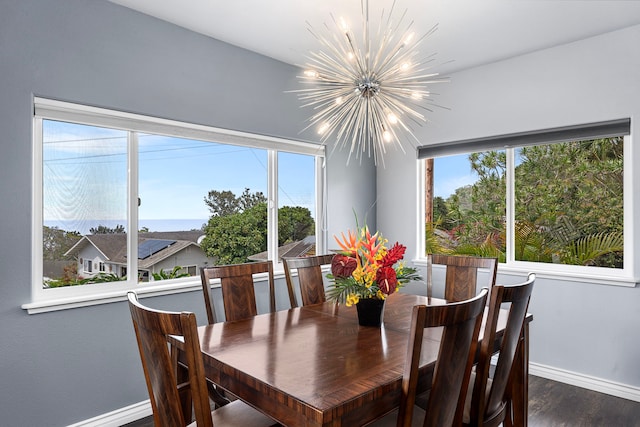 73-4100 Kulanui Pl, Kailua-Kona, HI 96740 - dining room with a chandelier, baseboards, healthy amount of natural light, and wood finished floors