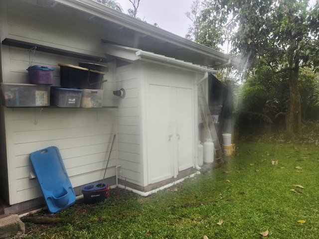 16-2126 Sugarcane Ln, Pahoa, HI 96778 - view of side of property with a lawn