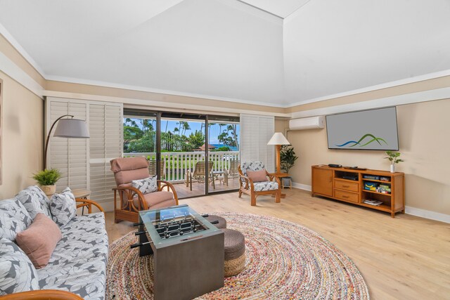 2253 Poipu Rd Unit 207, Koloa, HI 96756 - living area featuring an AC wall unit, high vaulted ceiling, wood finished floors, and baseboards