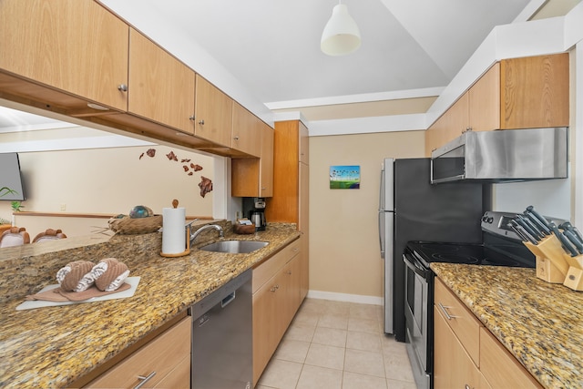 2253 Poipu Rd Unit 207, Koloa, HI 96756 - kitchen with appliances with stainless steel finishes, a sink, light stone counters, light tile patterned flooring, and baseboards