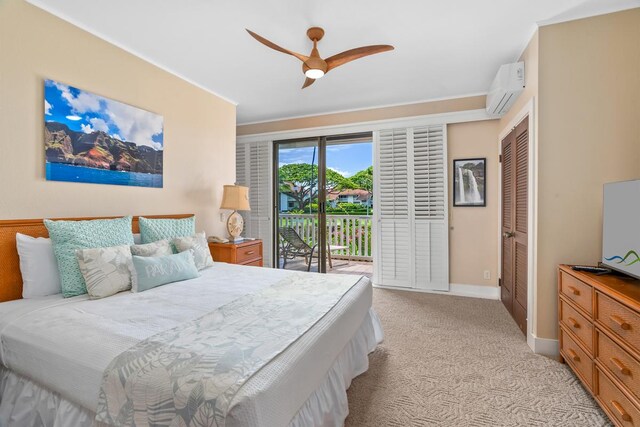 2253 Poipu Rd Unit 207, Koloa, HI 96756 - bedroom featuring access to outside, light colored carpet, a wall mounted AC, baseboards, and a ceiling fan