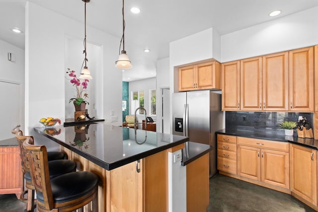 73-1125 Hamanamana St, Kailua-Kona, HI 96740 - kitchen featuring stainless steel fridge, decorative backsplash, recessed lighting, a kitchen breakfast bar, and hanging light fixtures
