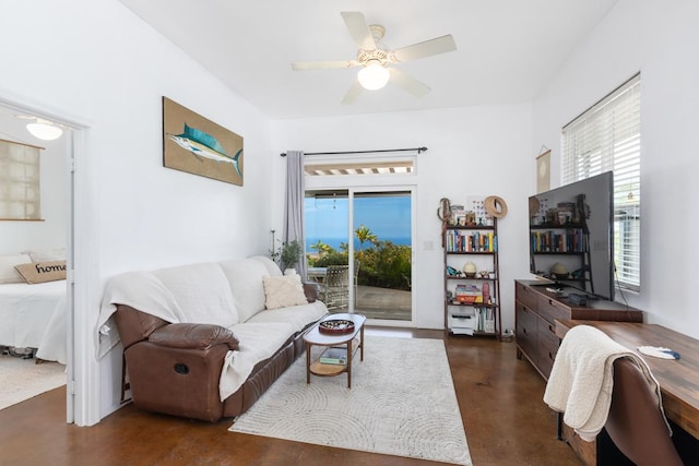 73-1125 Hamanamana St, Kailua-Kona, HI 96740 - living room with a ceiling fan and concrete flooring