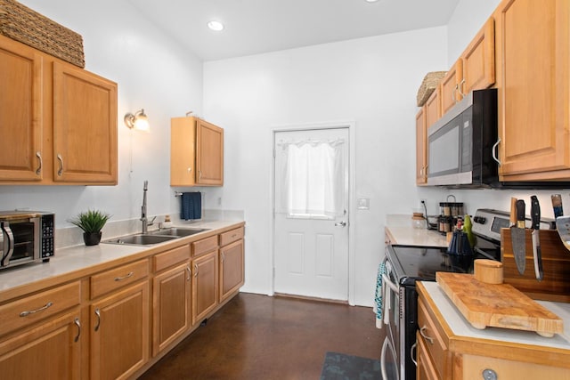 73-1125 Hamanamana St, Kailua-Kona, HI 96740 - kitchen with appliances with stainless steel finishes, a sink, concrete flooring, light countertops, and recessed lighting