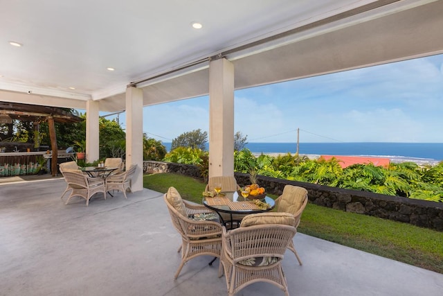 73-1125 Hamanamana St, Kailua-Kona, HI 96740 - view of patio with outdoor dining space and a water view