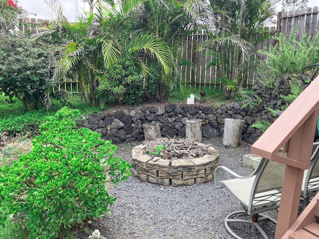 92-8744 Trade Wind Blvd, Ocean View, HI 96737 - view of patio / terrace featuring a fire pit