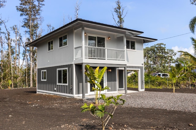 16-2097 Azure Dr, Pahoa, HI 96778 - rear view of property featuring a balcony and driveway