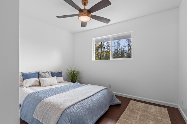16-2097 Azure Dr, Pahoa, HI 96778 - bedroom with baseboards, dark wood-style flooring, and ceiling fan