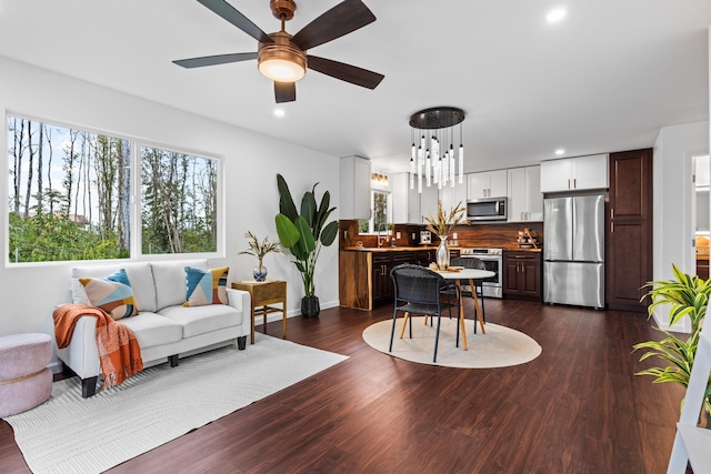 16-2097 Azure Dr, Pahoa, HI 96778 - living area with recessed lighting, dark wood-style flooring, ceiling fan, and baseboards