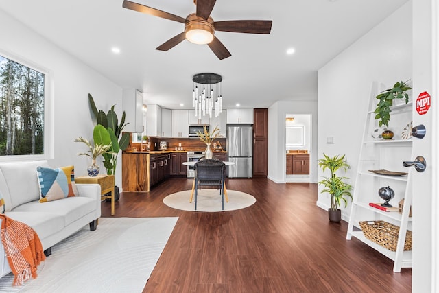 16-2097 Azure Dr, Pahoa, HI 96778 - living area featuring a ceiling fan, dark wood-style flooring, and recessed lighting