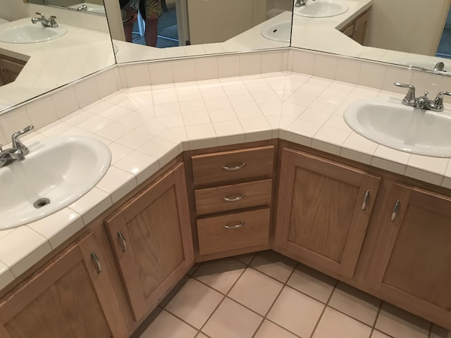 1831 Poipu Rd Unit 324, Koloa, HI 96756 - bathroom featuring double vanity and tile patterned flooring