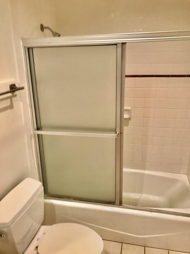 1831 Poipu Rd Unit 324, Koloa, HI 96756 - full bathroom featuring toilet, combined bath / shower with glass door, and tile patterned flooring