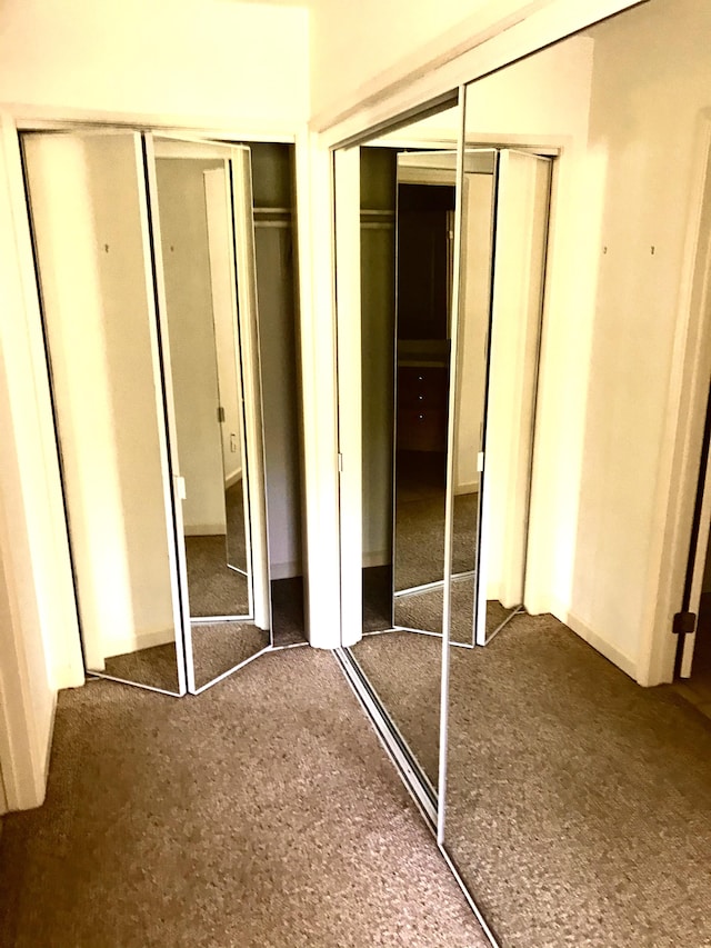 1831 Poipu Rd Unit 324, Koloa, HI 96756 - unfurnished bedroom featuring multiple closets