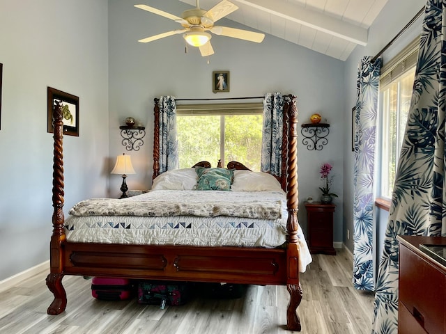 92-8414 Bamboo Ln, Ocean View, HI 96737 - bedroom featuring beamed ceiling, baseboards, wood finished floors, a ceiling fan, and high vaulted ceiling