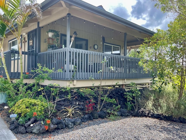 92-8414 Bamboo Ln, Ocean View, HI 96737 - view of property exterior featuring covered porch