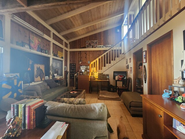 88-1501 Ala Malino Rd, Captain Cook, HI 96704 - tiled living area featuring wooden ceiling with exposed beams, stairs, and high vaulted ceiling