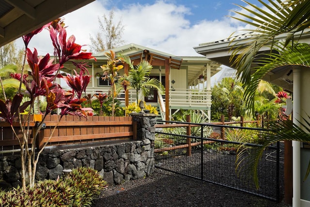 12-160 Moanauli Loop, Pahoa, HI 96778 - entrance to property featuring covered porch and a gate