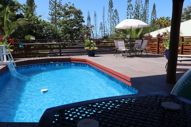 12-160 Moanauli Loop, Pahoa, HI 96778 - view of pool featuring a deck and outdoor dining area