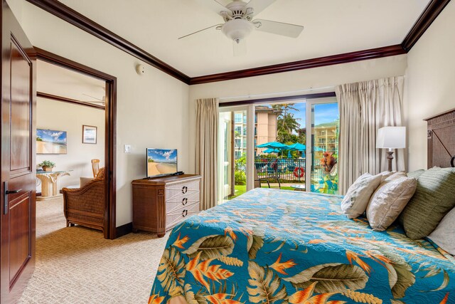 4-820 Kuhio Hwy Unit A101, Kapaa, HI 96746 - bedroom with ornamental molding, light colored carpet, access to outside, ceiling fan, and baseboards