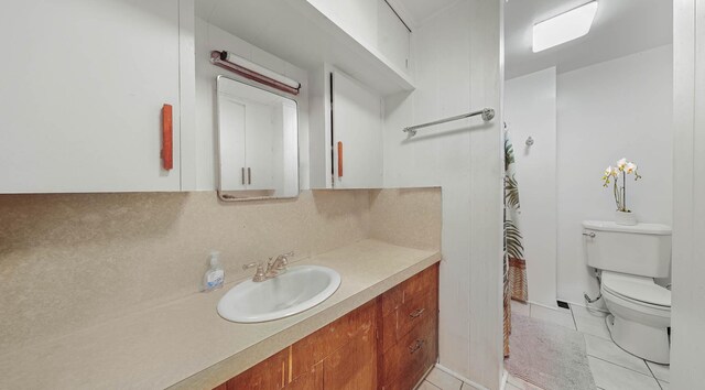 267 Hookipa Rd, Kapaa, HI 96746 - bathroom with toilet, vanity, and tile patterned floors