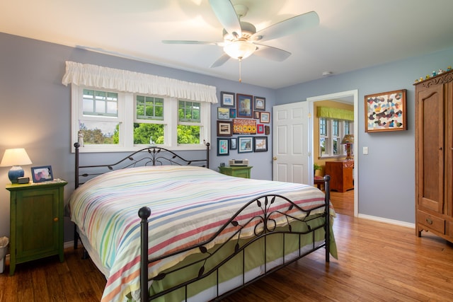 54-2319 Kynnersley Rd, Kapaau, HI 96755 - bedroom with baseboards, wood finished floors, and a ceiling fan