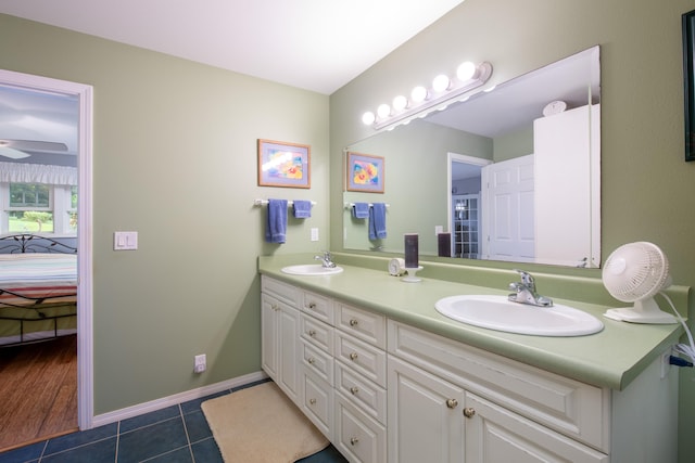 54-2319 Kynnersley Rd, Kapaau, HI 96755 - full bath with double vanity, ensuite bathroom, baseboards, and tile patterned floors
