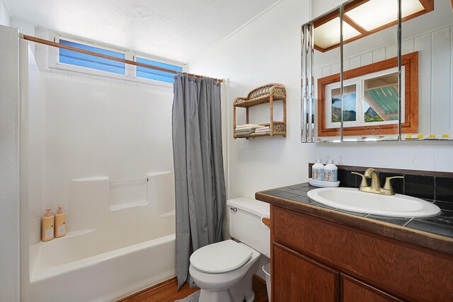 4934 Aliomanu Rd, Anahola, HI 96703 - full bathroom with toilet, vanity, shower / tub combo with curtain, and wood finished floors