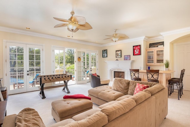 71-1714 Puu Napoo Dr, Kailua-Kona, HI 96740 - living area featuring french doors, light carpet, crown molding, ceiling fan, and plenty of natural light