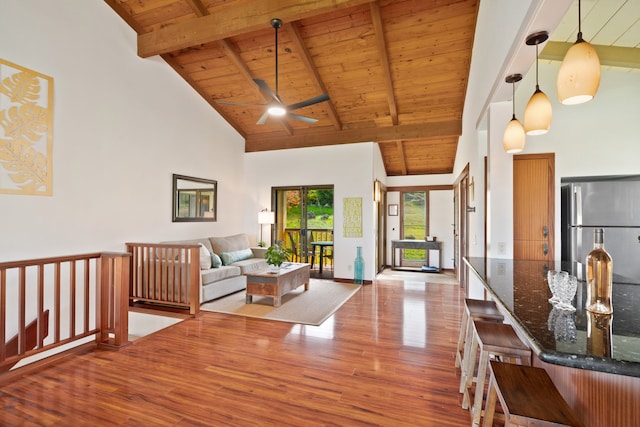 1870 Hoone Rd Unit 600, Koloa, HI 96756 - living area featuring wooden ceiling with exposed beams, wood finished floors, a ceiling fan, and high vaulted ceiling