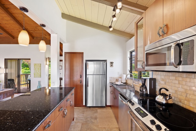1870 Hoone Rd Unit 600, Koloa, HI 96756 - kitchen featuring stainless steel appliances, a sink, wood ceiling, decorative backsplash, and light stone finish floors