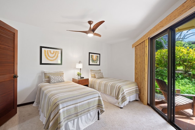 1870 Hoone Rd Unit 600, Koloa, HI 96756 - bedroom featuring light colored carpet, access to exterior, and ceiling fan