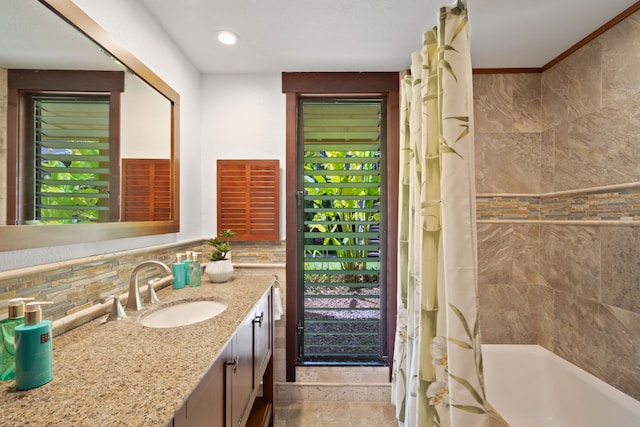 1870 Hoone Rd Unit 600, Koloa, HI 96756 - full bathroom featuring vanity, backsplash, shower / tub combo, healthy amount of natural light, and recessed lighting