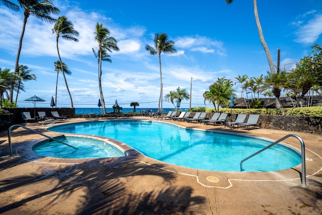 1870 Hoone Rd Unit 600, Koloa, HI 96756 - community pool with a patio area and a hot tub