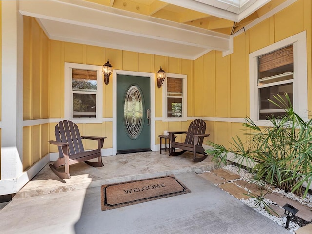 71-1371 Puu Kamanu Ln, Kailua-Kona, HI 96740 - doorway to property with covered porch and board and batten siding