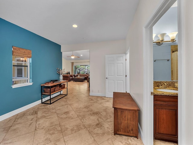 71-1371 Puu Kamanu Ln, Kailua-Kona, HI 96740 - hall with a sink, baseboards, and recessed lighting