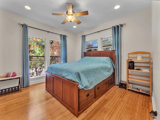 71-1371 Puu Kamanu Ln, Kailua-Kona, HI 96740 - bedroom with light wood finished floors, multiple windows, recessed lighting, and ceiling fan
