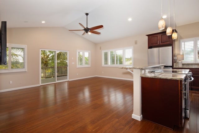 68-3912 Kaulele Pl, Waikoloa, HI 96738 - kitchen featuring appliances with stainless steel finishes, ceiling fan, a breakfast bar area, dark wood-style floors, and open floor plan