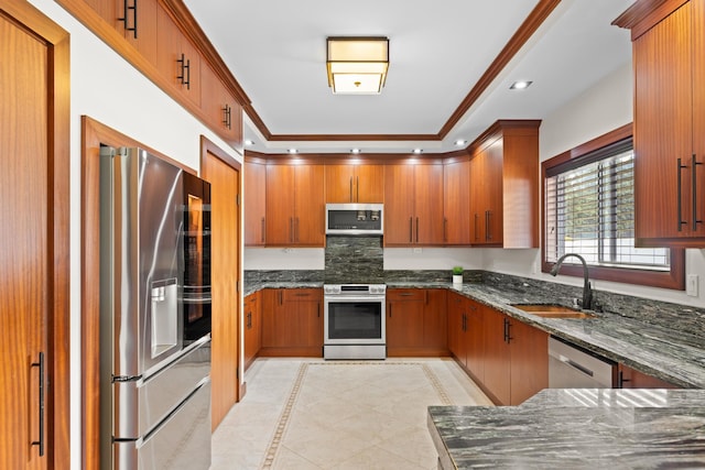 15-1594 22nd Ave, Keaau, HI 96749 - kitchen featuring appliances with stainless steel finishes, a sink, brown cabinetry, and recessed lighting