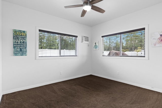 15-1594 22nd Ave, Keaau, HI 96749 - empty room with dark colored carpet, ceiling fan, baseboards, and an AC wall unit