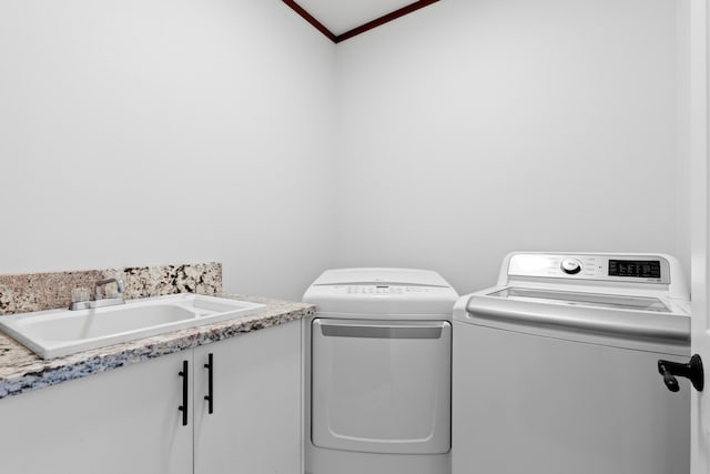 15-1594 22nd Ave, Keaau, HI 96749 - laundry area with washer and clothes dryer, crown molding, and cabinet space