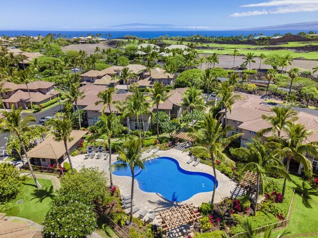 69-555 Waikoloa Beach Dr Unit 2604, Waikoloa, HI 96738 - aerial view of residential area featuring a pool and a nearby body of water