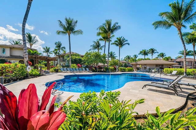 69-555 Waikoloa Beach Dr Unit 2604, Waikoloa, HI 96738 - community pool with a patio